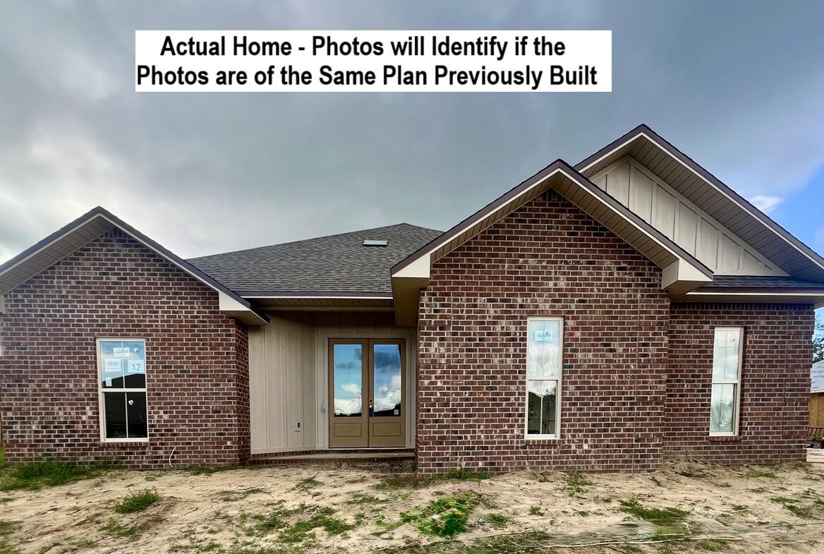 South of I-10 Located in the Gated Community of Chanan Estates with County Property Taxes. Be the 1st to live in this BRAND NEW 2025 Brick Home. FLOOR PLAN and SAMPLE PHOTOS ARE ATTACHED. Perfect for MULTIGENERATIONAL Living or HOME OFFICE, HUGE UPSTAIRS BONUS Room Plus 5 Bedrooms & 3 Full Baths Downstairs. Oil Rubbed Bronze Finishes, QUARTZ Counter-Tops, STAINLESS Appliances Include, ISLAND RANGE HOOD, Slide-In Range, MICROWAVE, Dishwasher, UNDER & OVER CABINET LIGHTING, Single Bowl Apron Sink, WALK-IN PANTRY with CUSTOM WOOD Shelving. MASTER SUITE - Private French Door Rear access to the Back Porch. Tray Ceiling with Stacked Crown Molding & Rope Lighting, Ceiling Fan, CUSTOM WALK-IN TILED SHOWER with Oversized Recessed NICHE- Freestanding SOAKING TUB, with TILE SURROUND, 2 Separate Quartz Top Vanities, Walk-in Closet with Custom Built Wood Shelving combined with Vented Shelving, Private Water Closet. Over 2500 Square Foot of Vintage Gray Porcelain Tile on the First Floor with Carpet upstairs. 8 Foot French Door Entry. 2 Car Side Entry Garage. ALL BEDROOMS Have Walk-in Closets and Ceiling Fans. BUILDER PAYS MOST CLOSING COST, ASK FOR DETAILS. No City of Crestview Property Taxes. Mechanical and Other Information: AstroGuard Hurricane Fabric for Windows & Doors is Included with this Home. SPRAY FOAM ATTIC INSULATION. The Yard will have a Sprinkler System Installed. ALL THE FINISHES IN THE SAMPLE PHOTOS WILL BE THE SAME ON THIS HOME EXCEPT THE EXTERIOR VINYL ITEMS COLOR, GARAGE DOOR COLOR, HARDI BOARD COLOR, AND SOME OF THE LIGHT FIXTURES MAYBE DIFFERENT.