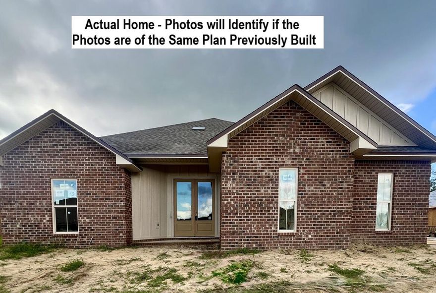 South of I-10 Located in the Gated Community of Chanan Estates with County Property Taxes. Be the 1st to live in this BRAND NEW 2025 Brick Home. FLOOR PLAN and SAMPLE PHOTOS ARE ATTACHED. Perfect for MULTIGENERATIONAL Living or HOME OFFICE, HUGE UPSTAIRS BONUS Room Plus 5 Bedrooms & 3 Full Baths Downstairs. Oil Rubbed Bronze Finishes, QUARTZ Counter-Tops, STAINLESS Appliances Include, ISLAND RANGE HOOD, Slide-In Range, MICROWAVE, Dishwasher, UNDER & OVER CABINET LIGHTING, Single Bowl Apron Sink, WALK-IN PANTRY with CUSTOM WOOD Shelving. MASTER SUITE - Private French Door Rear access to the Back Porch. Tray Ceiling with Stacked Crown Molding & Rope Lighting, Ceiling Fan, CUSTOM WALK-IN TILED SHOWER with Oversized Recessed NICHE- Freestanding SOAKING TUB, with TILE SURROUND, 2 Separate Quartz Top Vanities, Walk-in Closet with Custom Built Wood Shelving combined with Vented Shelving, Private Water Closet. Over 2500 Square Foot of Vintage Gray Porcelain Tile on the First Floor with Carpet upstairs. 8 Foot French Door Entry. 2 Car Side Entry Garage. ALL BEDROOMS Have Walk-in Closets and Ceiling Fans. BUILDER PAYS MOST CLOSING COST, ASK FOR DETAILS. No City of Crestview Property Taxes. Mechanical and Other Information: AstroGuard Hurricane Fabric for Windows & Doors is Included with this Home. SPRAY FOAM ATTIC INSULATION. The Yard will have a Sprinkler System Installed. ALL THE FINISHES IN THE SAMPLE PHOTOS WILL BE THE SAME ON THIS HOME EXCEPT THE EXTERIOR VINYL ITEMS COLOR, GARAGE DOOR COLOR, HARDI BOARD COLOR, AND SOME OF THE LIGHT FIXTURES MAYBE DIFFERENT. HOA Dues $220.00 Per Quarter + $41.00 Per Quarter SA & CC of 0.25%. 