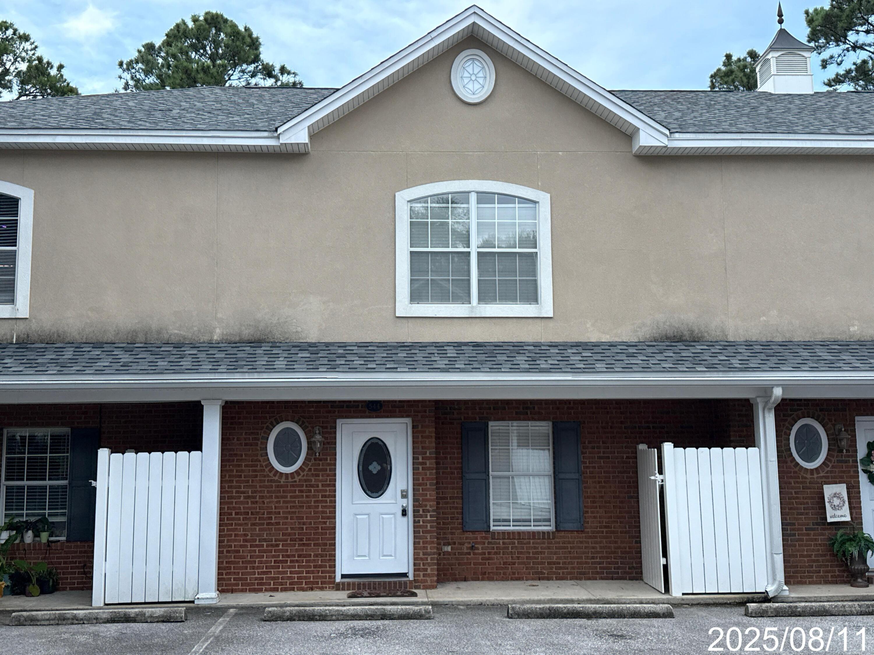 Fabulous 3-bedroom, 2.5-bath townhome located in the heart of Niceville, offering a convenient commute to local bases, schools, shopping, and the beach. This beautiful two-story home features an open and inviting layout. The first floor is fully tiled and offers a spacious living room, a large kitchen with ample cabinet and granite counter space, stainless steel appliances, including a smooth cooktop stove, a pantry, breakfast bar, and a separate dining area. You'll also find a half bath for guests, an Ecobee smart thermostat, and a laundry room on this level. Step outside to a large deck that overlooks a peaceful wooded area, perfect for relaxing or entertaining.Upstairs, the grand master bedroom features its own en suite bath, while two additional guest bedrooms share a separate full bathroom. Pets may be considered (restrictions apply), and smoking is not permitted, including vaping.