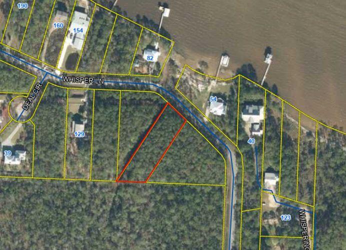 Fantastic Opportunity to own a 3/4-acre level lot in the highly desirable Santa Rosa Beach area. This property boasts **unobstructed, forever-protected views of the Bay**, ensuring your panoramic scenery will never change. Imagine unwinding on your future porch or balcony, embracing the gentle breezes and breathtaking sunsets.  Ideally situated, this lot offers easy access to boat launches, top-rated dining, world-class beaches, and the vibrant lifestyle of 30-A. With **no HOA restrictions and no build-out timeframe**, you have the flexibility to design and build your dream home at your own pace. An updated survey and wetland assessment are already available for your convenience.