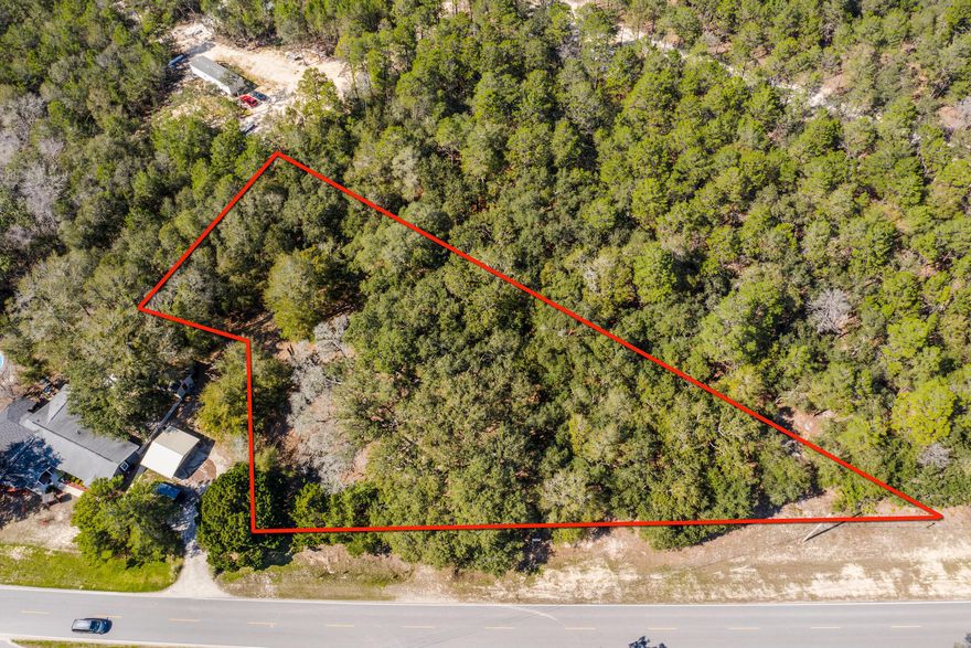 Lots of potential for this property with No restrictions. It is located so close to Hammock Bay and downtown Freeport that it makes it convenient to Build your home, workshop, storage building, office, pole barn and more! Lots of room and already split in two lots and In X Flood! No need to bring in Fill! High and dry!This property has recently been cleared so please walk the grounds to see it's beauty.