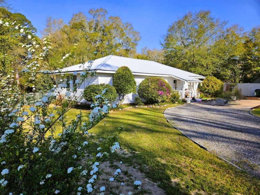 Positioned in the heart of DeFuniak Springs' charming historic district, this unique property offers a rare opportunity to own approximately 1.42 acres just steps from iconic Circle Drive and Lake DeFuniak. Properties of this size are exceptionally uncommon within the historic district, providing a blend of character, space, and future potential that is increasingly difficult to find.The existing residence features classic character with solid pine flooring and walls throughout, and sits on a beautifully sized parcel with with expansive grounds and ample room for expansion, or additional structures to add to the existing almost new shed. Whether you envision restoring and enhancing the current home or maximizing the land's potential, the possibilities here are compelling. Enjoy a walkable lifestyle to downtown DeFuniak Springs, with its local shops, dining, and community events centered around the lake. Additionally, this location offers convenient access to the white sand beaches and world-class amenities of South Walton and Scenic Highway 30A, making it an ideal balance between small-town charm and coastal living.

This is a rare chance to secure a large homesite in a highly desirable historic setting--perfect for homeowners, investors, or those seeking a long-term land play in a growing market.