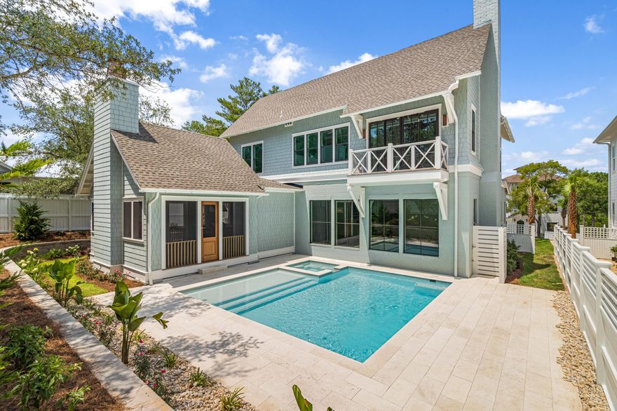 Enjoy the ultimate beach lifestyle with this stunning residence, perfectly balancing privacy, convenience, and elegance. Boasting 4 bedrooms, 4.5 baths, a private pool, and a three-car garage, this impeccably designed, two-level home spans 3,846 square feet, offering a serene oasis nestled along a secluded street.Step inside and be greeted by upgraded finishes and features, including Venetian plaster, designer wallpaper, mitered and coffered ceilings, hardwood floors, and stunning tiled bathrooms. The first level includes an open concept living and dining space, kitchen, and a junior master suite. A chef's dream, the kitchen is outfitted with a large center island, quartz countertops, a mosaic tile backsplash, Wolf & Subzero appliances, and custom cabinetry. Accessed from the double doors in the living area, a screened outdoor porch with summer kitchen and fireplace leads to the private pool with spa and sun shelf. A custom mud room with built-in bench, lockers, and cabinets is the perfect place to store beach gear. Upstairs, find a secondary living area or bonus room, two guest bedrooms, and the grand master suite with private balcony. Designer lighting throughout adds a coastal ambiance to the soothing color palette utilized throughout this property. Don't miss this special opportunity!