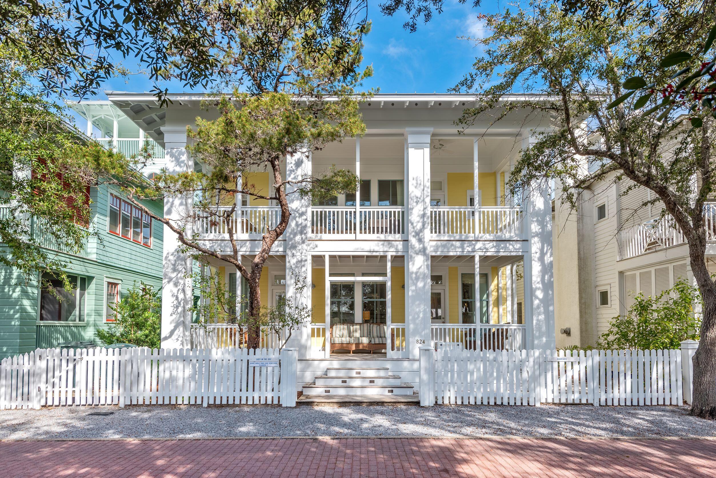 This fabulous beach home is exceptionally functional for a large or extended family and enjoys a prime location!  Overlooking the west-end family pool complex, you could almost relax on your front porch while watching the kiddos splash around.  And being just a stone's throw from the beach, your family can enjoy the best of what Seaside offers!With a creative design, ''Lucy in the Sky'' and ''Diamonds'' offers a very flexible floor plan depending on your needs.  Because the main and guest houses blend so seamlessly, you can create a variety of options - the guest house could have one bedroom while the main house has four; or the guest house could have two bedrooms while the main house has three; or any combination that works best for your family.  Access to the guest house can be from