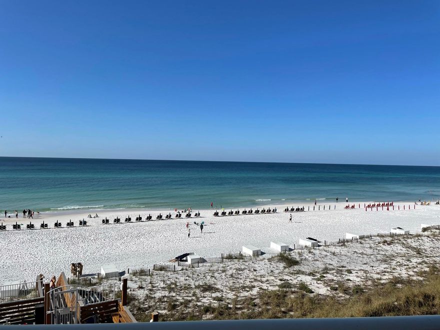 Ideally located on the fourth floor this beautiful beachfront wrap around condo has expansive views of the gulf from east to west. With three bedrooms and two bathrooms, the condo has been recently updated, including full renovation of the master and guest bathrooms, barn doors to the utility nook, new kitchen and dining light fixtures, and interior completely painted. Floors are contiguous travertine throughout. Kitchen counters and backsplash are unique granite and complimenting square tile backsplash. Currently unfurnished. Custom white weave, lined drapes on order and included in unfurnished price, installation approx. 4/15/2021.Complete furniture package installation available to prospective buyer to be ready for season!