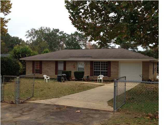 A Cute 3 bedroom country brick home that sits on almost an half acre lot. Property is Sold As! Home is need of a new roof.