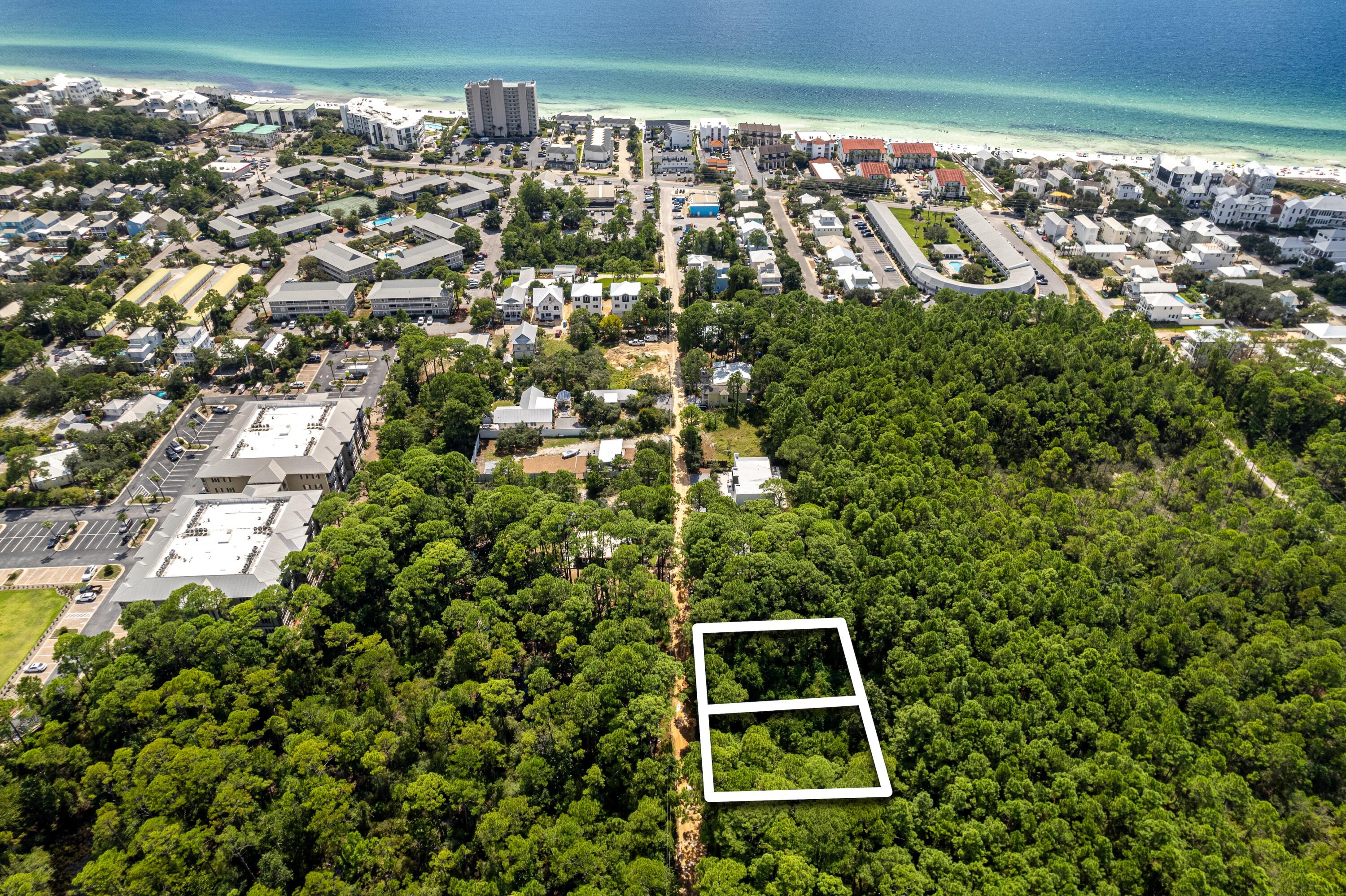 Seize an exceptional opportunity to acquire two adjacent wooded lots on Campbell Street in Seagrove Beach, just off Highway 30A. Together, this expansive 100 x 150 ft combined parcel provides a rare chance to maximize your building footprint, creating the ultimate custom coastal retreat. With a survey available and no HOA restrictions, the lots offer unparalleled flexibility in design and development. Located in a prime, serene setting with close proximity to the Santa Clara Beach Access, this unique offering is ideal for those looking to invest in a significant presence on 30A.