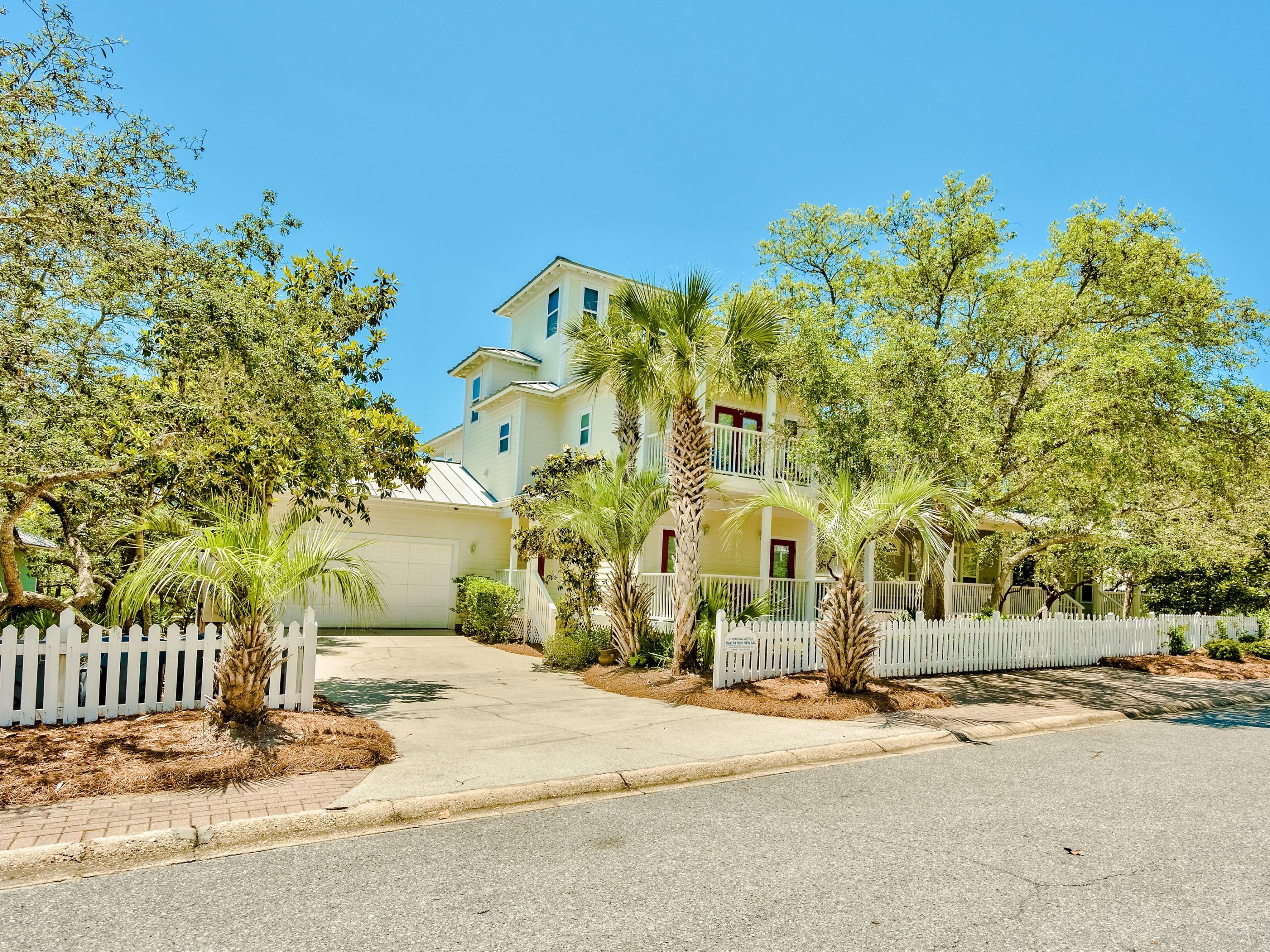 Beachy Florida cottage in the coveted, gated community of Old Florida Beach, centrally located on an over-sized lot backing up to neighborhood green space, one of six homes to share this open area view to the gulf. Just steps to the beach walkovers, the community pool and the Draper Lake dock. The first floor has 3 bedrooms, including the master suite. The second floor has open kitchen to family room and outdoor porch and also has the second master bedroom. The third floor tower offers additional sleeping and family room area with amazing views of the Gulf of Mexico. Sought after 2 car attached garage. Great rental property or primary home. Old Florida Beach community is located south of 30A directly on a private beach, has heated community pool, lake dock, and 3 private beach access.