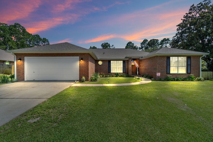 Welcome to your dream home in Holley By The Sea! This stunning 4-bedroom, 2-bathroom brick home nestled on a half-acre lot is the epitome of comfort, style, & functionality. From the wood-look flooring to the spacious backyard, this property has everything you need for modern living. As you step inside, you'll immediately notice the exquisite wood-look flooring & tile that grace all the common areas, giving the home a warm and inviting ambiance.The carpeted bedrooms provide a cozy retreat, ensuring a peaceful night's rest.The heart of the home is the kitchen, w/ stainless appliances & granite countertops that provide an elegant touch & a durable surface for all your culinary adventures. The subway tile backsplash adds a touch of sophistication to the space. Water heater 2020, roof 2019 Plus, the convenience of a pantry ensures all your essentials are neatly organized.

A formal dining room adds a touch of elegance, making it an ideal space for hosting dinner parties or enjoying intimate family meals. The spacious family room offers a comfortable area for relaxation and quality time with loved ones, making it the perfect spot for movie nights or game days.

The primary bedroom features an ensuite bathroom with a double vanity adorned with granite countertops. The garden tub invites you to unwind and indulge in a soothing soak, while the separate shower provides a quick and refreshing way to start the day.

Outside, the large backyard beckons with endless possibilities. Enjoy sunny afternoons on the open patio, shaded by a stylish pergola that adds a touch of charm to your outdoor space. With this vast expanse, there's ample room to create your very own backyard paradise, complete with a refreshing pool for hot summer days and lively gatherings.
Holley By The Sea is a community known for its tranquil atmosphere and excellent amenities. As a homeowner here, you'll gain access to the community's recreational facilities, including pools, tennis courts, and a clubhouse. Not to mention, this location is convenient to the area's beautiful beaches, providing the perfect backdrop for leisurely strolls and memorable sunsets.