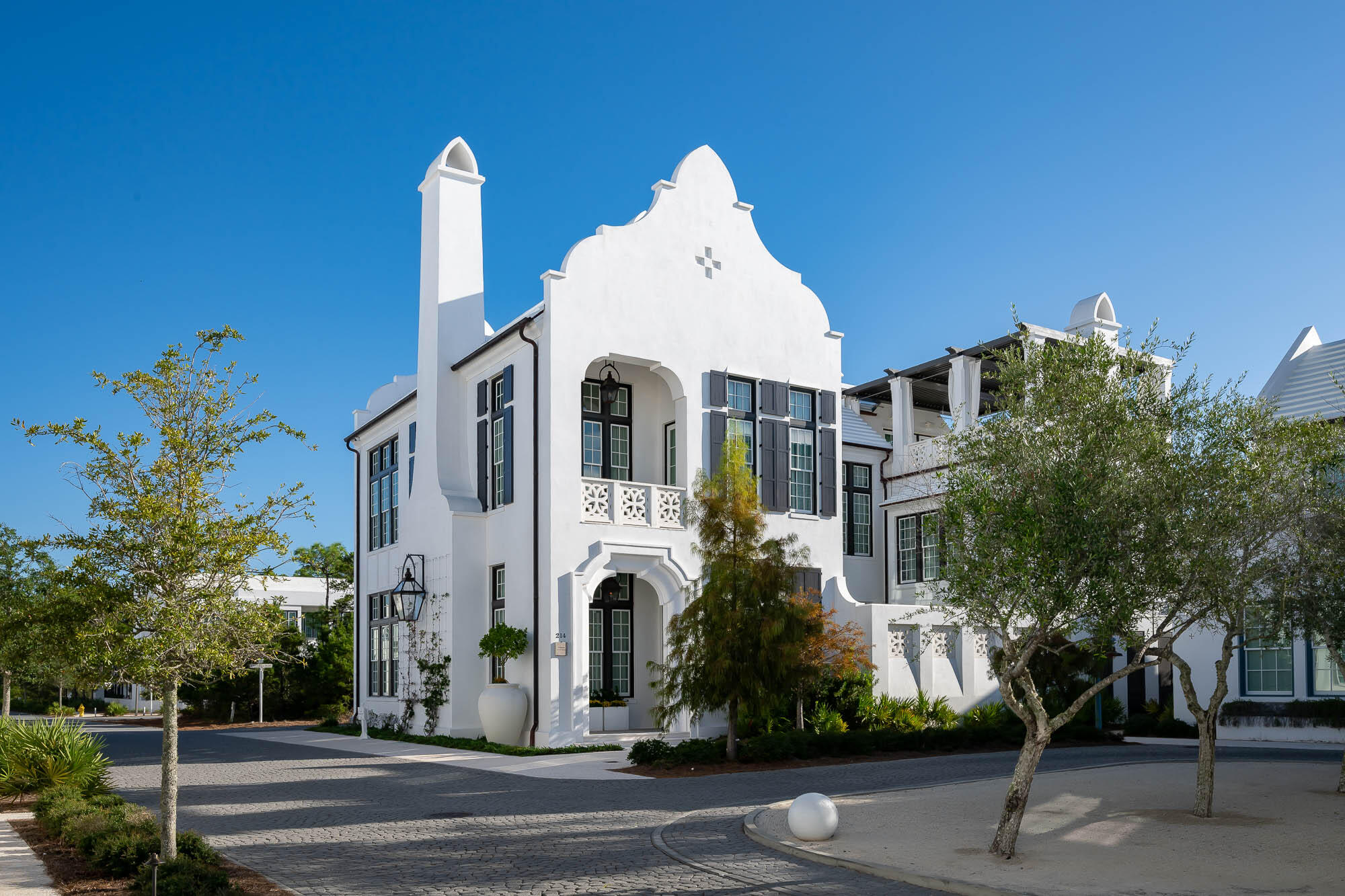 Acquired excellence has been achieved with the exquisite architectural design of 214 N. Charles Street by Domin Bock Architects & Fouquet Interior Design. No detail was spared with design and fixtures & finishes.  This incredible home looks upon one of Alys Beach's most intimate greens, Papilio Park. Sight lines from the generous 3rd level roof terrace provides views of the Alys architecture accented with Gulf of Mexico views.  5,745 square feet of elegance delivering 5 bedrooms, 6 full bathrooms and 2 powder bathrooms.Meticulously bound in all details, 214 N. Charles Street encapsulates grandeur and functional living for partial or primary residency. Indoor & outdoor living comingle creating compatibility into one space, taking full advantage of the home's numerous