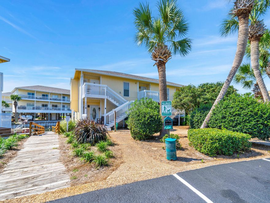 CANAL FRONT, HARBOR VIEW - 1 Bedroom / 1 Bath Condo GROSSED OVER $30,000 Rental Income in 2023.  This is an END UNIT with HUGE BALCONY, perfect for relaxing after a day at the beach.  Sleeps 4 comfortably & being sold fully furnished. SANDPIPER COVE is a beachfront resort-style community situated on 43 acres w/ 1100 feet of DEEDED PRIVATE BEACHFRONT, seasonal beach rental service & snack bar, 9 hole pitch 'n putt course, grill areas, Bocci ball courts, three Tennis Courts, 8 LIGHTED PICKLE BALL COURTS, 5 Swimming Pools (two heated), 3 hot tubs, CANAL DOCKAGE for boats under 25 feet, boat launch, long term slip leasing (by reservation/availability), and on-site waterfront restaurant. Nearby 98 Palms Shopping Center makes errand shopping & dinner out easy!  Call today for more info!