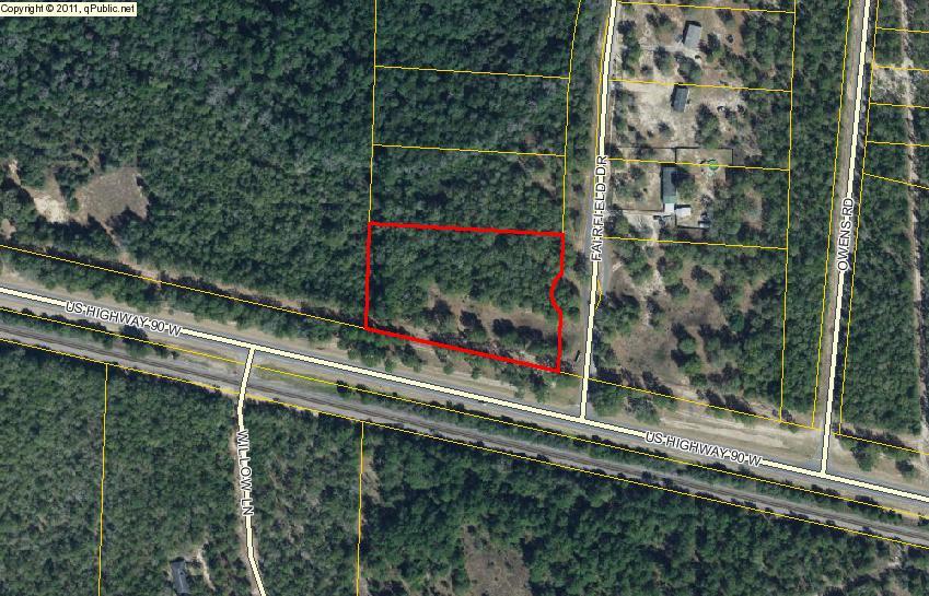 This large home site lot is bordered on the west side of Fairfield Dr. and has appx. 425 feet of HWY 90 W frontage. Lot is level and ready clearing for a home or Manufactured Home.