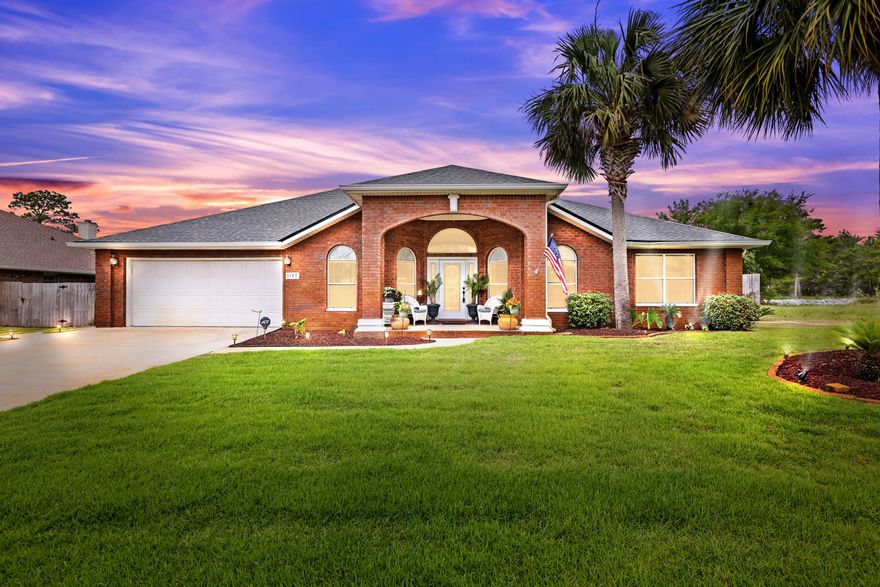 Welcome to 1745 Brooke Beach Drive, a coastal haven nestled in the picturesque community of Navarre, Florida. This stunning property boasts an ideal blend of contemporary luxury and coastal charm, offering an unparalleled lifestyle experience. Situated on a serene street, this meticulously crafted residence invites you to indulge in beachside living at its finest. The exterior exudes timeless elegance with its tasteful landscaping, inviting porch, and vibrant hues that complement the surrounding natural beauty.Step inside to discover a thoughtfully designed interior flooded with natural light and adorned with upscale finishes. The spacious floor plan seamlessly integrates living, dining, and entertaining areas, creating an atmosphere of comfort and sophistication.