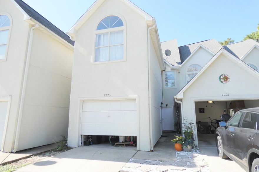 BACK ON THE MARKET WITH NO FAULT TO THE SELLERS. Large Townhome in Hidden Bay Village - a quiet, waterfront community across the street from fairways at Hidden Creek Golf & Country Club (Membership Available). There are two community pools in the neighborhood and a dock with available deep water boat slips and East Bay access. The kitchen features  granite countertops & breakfast bar. Tiled in the entryway, kitchen and baths. Very well maintained carpet throughout the home. Designer cabinet sink installed in half bath downstairs. Two bedrooms feature vaulted ceilings. Located just minutes from the Beach.