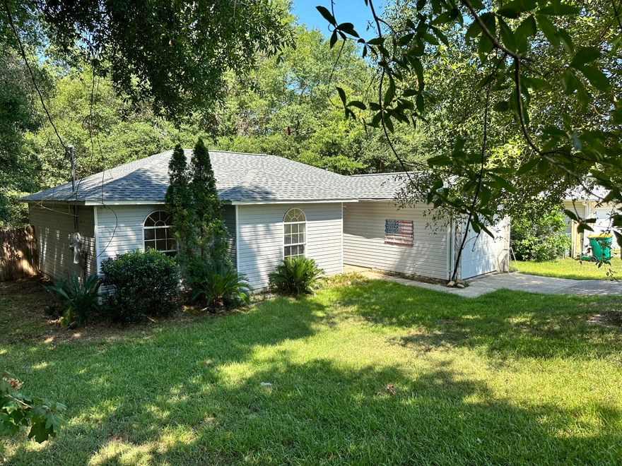Welcome to this neighborhood south of I-10 in Crestview. Recently updated 3 bedroom 2 bathroom house with large back yard and a large back deck. This home is very private with woods behind it and on the left side of home. Washer Dryer hookup. Vaulted ceiling in living room. Spacious and somewhat open between Great Room and Dining area to kitchen.