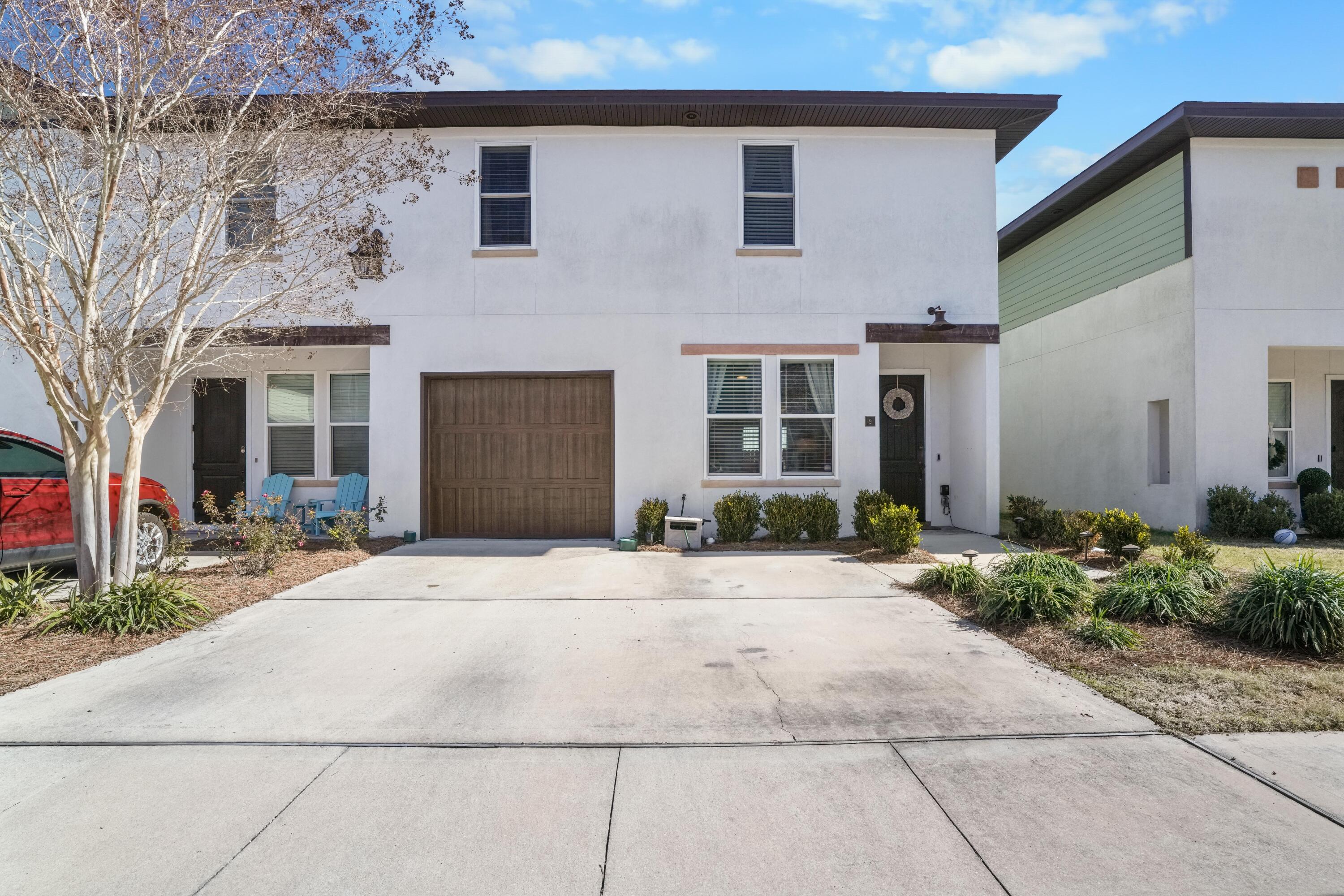 Welcome to this beautifully appointed townhome, where upscale design meets effortless comfort. From the moment you step inside, you'll be captivated by soaring ceilings, stylish upgrades, and an inviting open floor plan designed for modern living.The main living area features elegant wood-look tile flooring, a warm and welcoming color scheme, and ample space to accommodate your favorite furnishings. The chef's kitchen is a true showstopper, boasting custom cabinetry, high-end countertops, and a spacious center island--perfect for entertaining. Adjacent to the kitchen, the dining area offers a sophisticated setting for gatherings, enhanced by a custom-paneled accent wall and a stunning chandelier. Upstairs, the luxurious primary suite is a retreat of its own, complete with an oversized walk-in closet and a spa-like en suite bathroom featuring a double vanity, a soaking tub, and a beautifully tiled walk-in shower. Two additional spacious bedrooms, each with walk-in closets, share a thoughtfully designed connecting bathroom with custom cabinetry.

Step outside to your private, low-maintenance patioideal for outdoor entertaining. Whether hosting a weekend barbecue or enjoying an evening under the stars, this inviting space is perfect for making memories with family and friends.

Don't miss your chance to own this exceptional homeschedule your private tour today!