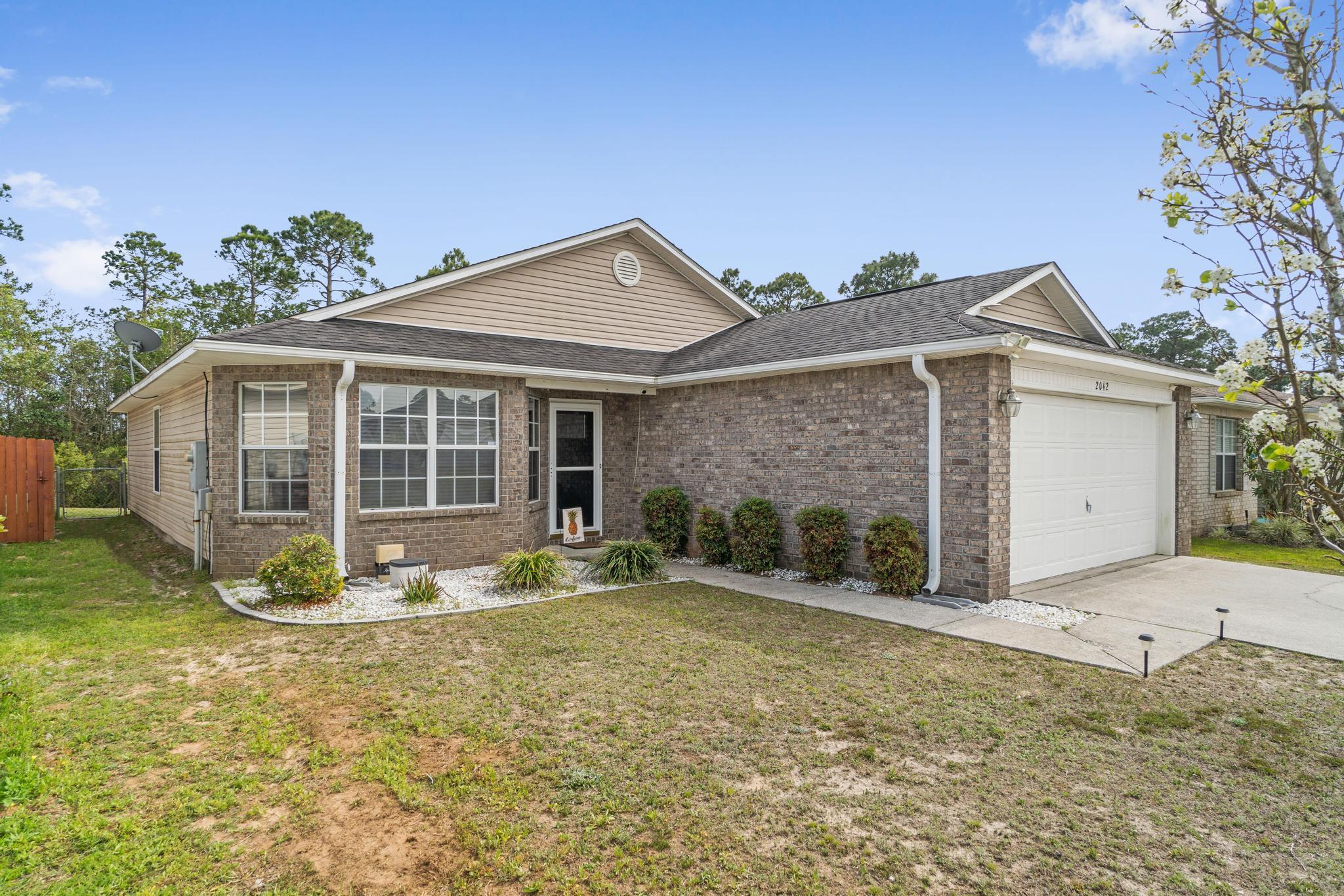 NEW ROOF BEING INSTALLED END OF APRIL. Coming soon to the Promise Creek subdivision! This 3BD 2BR is a very well maintained home and located in central Navarre. Be prepared to entertain your guests with this open concept floorplan and vaulted livingroom ceiling! Enjoy a fire out back while the dog plays in the fenced in backyard. Settle in for the night in your spacious master bedroom featuring a double vanity master bath and walk in closet. This property resides 1 mile from the Holley-Navarre Primary School, 25 minutes from Hurlburt Field, and 10 minutes from Navarre Beach. Schedule your showing today!