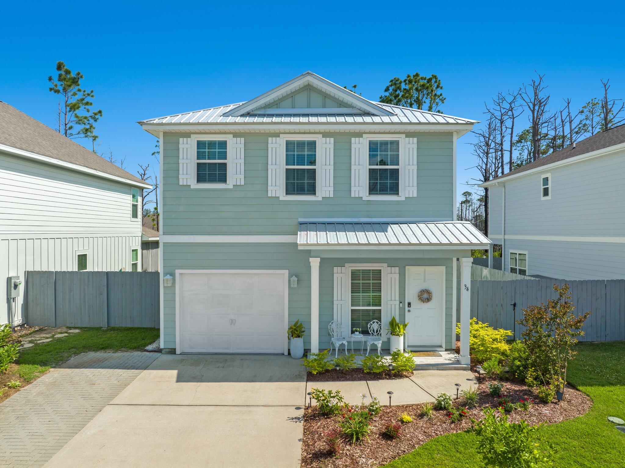 Immaculate Florida Cottage S of Hwy 98 conveniently located just off main thoroughfare connector Thompson Road. Low HOA fees, pets allowed and no short-term rentals! Exterior features new metal, galvalume roof, 2 new heat pumps and all new paint 2021. Interior boasts new appliances including natural gas stove, all new interior walls, paint, insulation, ceiling fans and most lighting fixtures also in 2021. New covered/screened rear porch 2024. Outdoor shower. 9 ' ceilings, granite counter tops, Luxury Plank Vinyl floors, recessed lighting throughout. All appliances inc. washer/dryer convey as does free standing fireplace unit.