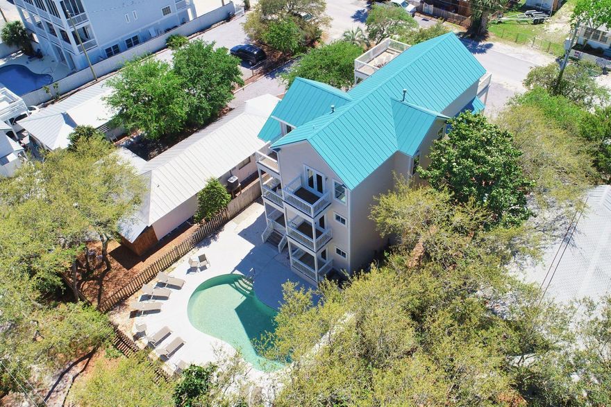 Back on market - previous buyer's inability to secure financing makes it available for you! Fabulous rental history on this classic Grayton Beach house with views of both the Gulf & Western Lake, just eight sites back from this world famous beach and The Red Bar! All baths & kitchen have been renovated! Each bedroom has en suite baths. This popular rental retreat offers everything needed for large family gatherings including a large pool with spacious sunning deck and huge bunk room w/ 4 built-in full size & 4 twin bunks and a foosball table for the kids! Individual balconies off bedrooms offer private getaways, yet plenty of room for all to lounge on huge decks just steps from world famous Grayton Beach, restaurants, and shops.