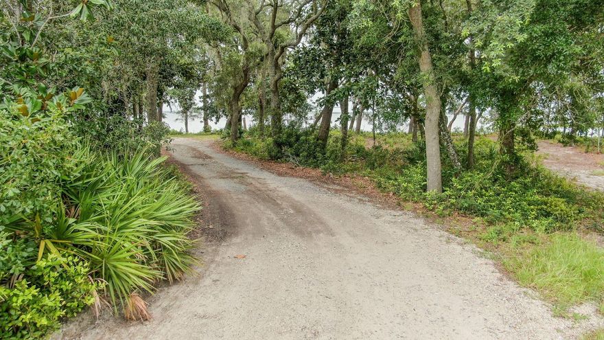 This is a must see Bayfront property! Beautiful trees, Private 1.48 acre lot with a private beach and owner has added a living shoreline with oyster reefs and grasses, incredible location for a boat dock either on the bay or on Maquaqe bayou. This is a piece of Paradise.A must see! Build your bayfront compound here!
