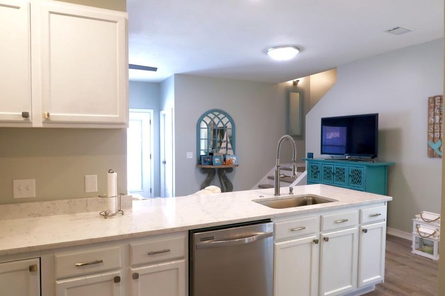 FRESH REMODEL! This townhome has so much to offer! Starting with its great location in Destin, you are minutes away from amazing dining and shopping. This townhome offers new roof, flooring, paint, counter tops, appliances, lighting throughout, hot water heater and more! The complex also has a community pool. You won't want to miss out on this gem!