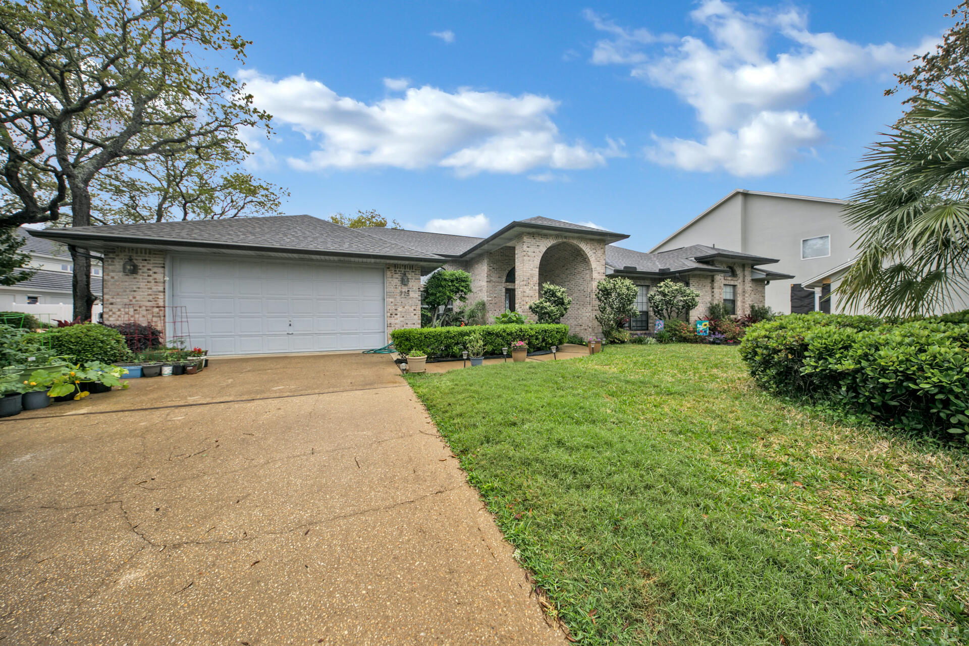 Exquisite waterfront estate on Lake Lorraine, overlooking the Bay with breathtaking views of Destin! This all brick home sits high and dry with an expansive screened-in lanai and gunite pool with gorgeous views of the water in every direction. The classic split floor plan appeals to many! The entire home has been renovated to include the kithen which is very large and inviting. The kitchen has 42 in upper cabinetry made of real wood, granite counters, all newer appliances and overlooks both living rooms, pool, lanai and enjoys stunning waterviews.Both living areas have large sliding glass doors so from almost every angle in the home you can see dolphins, boats and watch the sunrise! The back living room has a gorgeous fireplace and tile flooring making this room great for relaxing, playing or working out.

The master suite has a large walk in tiled shower, jetted tub, and dual sinks. On the opposite side of the home you will find two spacious bedrooms, one with waterview and both sharing a full bath with tiled tub/shower surround, new vanity and toilet. Towards the master and front of the home is a 4th bedroom with a 1/2 bathroom.