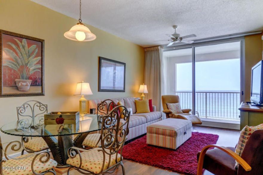 BEST OF THE BEST IN MAJESTIC! PERFECT ELEVATION WITHIN THE STACK!! This one of a kind property conjures up images of sun-splashed days of swimming, biking, and relaxing. It lives like a beach house but comes with all the benefits of owning a condo. This property has been meticulously maintained: New HVAC in 2017, new hot water heater 2018! Hard surface flooring throughout and conveys with luxurious furnishings, window treatments, and artwork that welcome you to lie back, relax, and enjoy panoramic views of the pool, beach and ocean. Condo has 9'. Open floorplan and 9' ceilings allow for fabulous Gulf and sunset views from balcony, living room, dining room, kitchen, & master suite providing the ultimate alfresco living and entertaining environment!