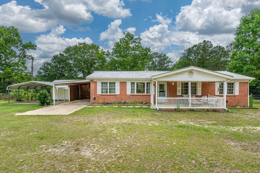 This great property will wow you! Located on 3.27 acres, featuring a pond view, a fig tree, pear tree, and lemon/lime trees, this is your new peaceful escape! The home features a lot of original hardwood flooring throughout, 4 bedrooms and 1.5 bathrooms, a gas stove, and peaceful views galore. Two large outbuildings both have electricity, and there is an RV hookup as well! Don't miss out on this wonderful retreat. Schedule your appointment today!