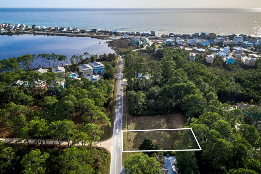Lot 5 is a ready to go level, cleared and filled building lot near Oyster Lake on the quieter west end of 30A. Possible coastal dune lake and Gulf views. Located a short walk to multiple public beach accesses and very close to heralded Santa Rosa Golf and Beach Club. With 75 ft of frontage this is a perfect sized building lot for your dream home in paradise. Conveniently located close to Gulf Place, Grand Boulevard, Publix and Sacred Heart Hospital this location is terrific for a primary or second home, or vacation weekly rental investment property.