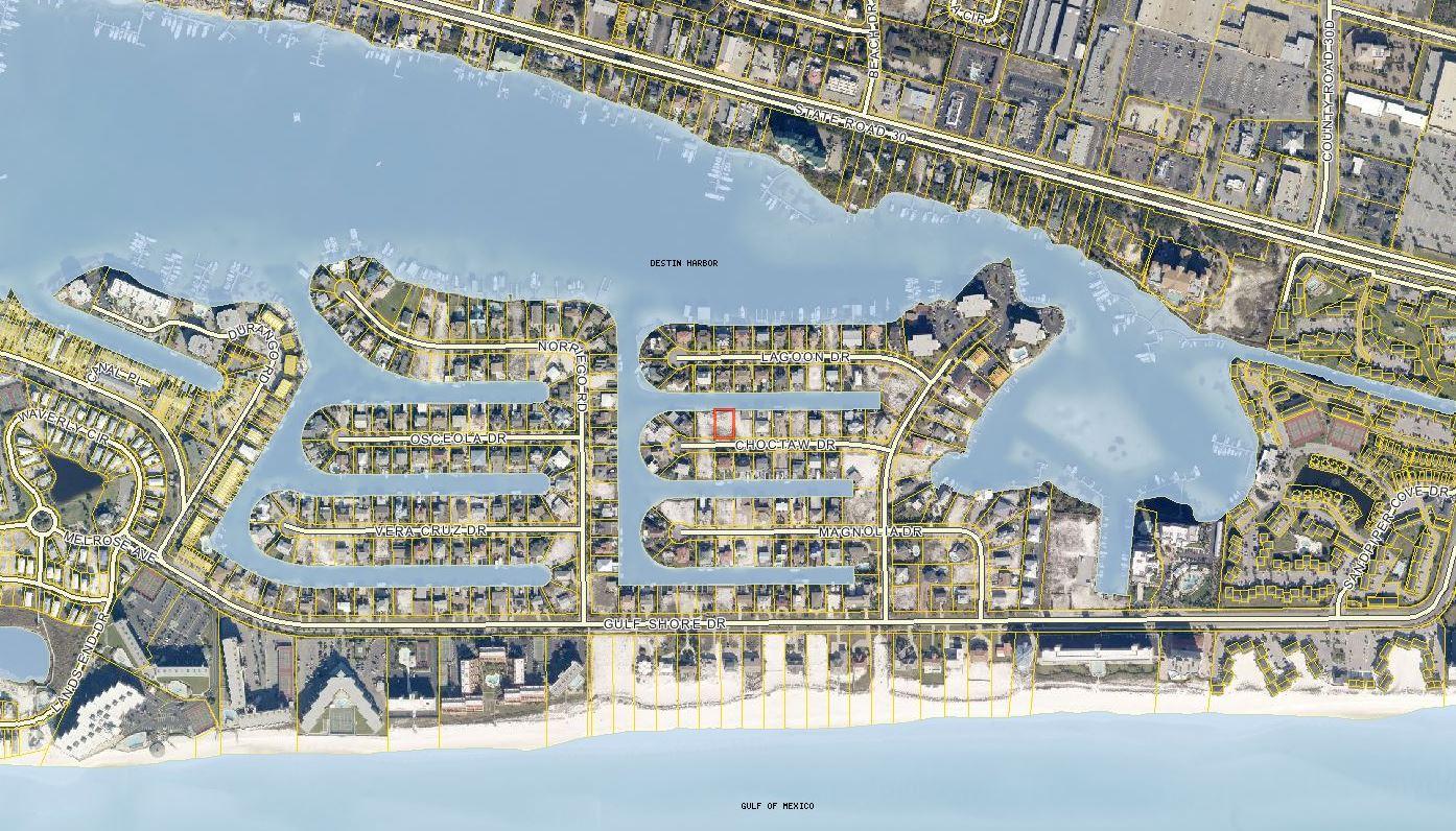 A boater's dream location! Deep protected water just minutes from Destin Harbor and the Gulf. The perfect Holiday Isle location to build your primary residence or second home. Deep water canal will accommodate a large boat. Beach access is just a short walk away. This property already has a seawall. Buyer to verify lot dimensions.