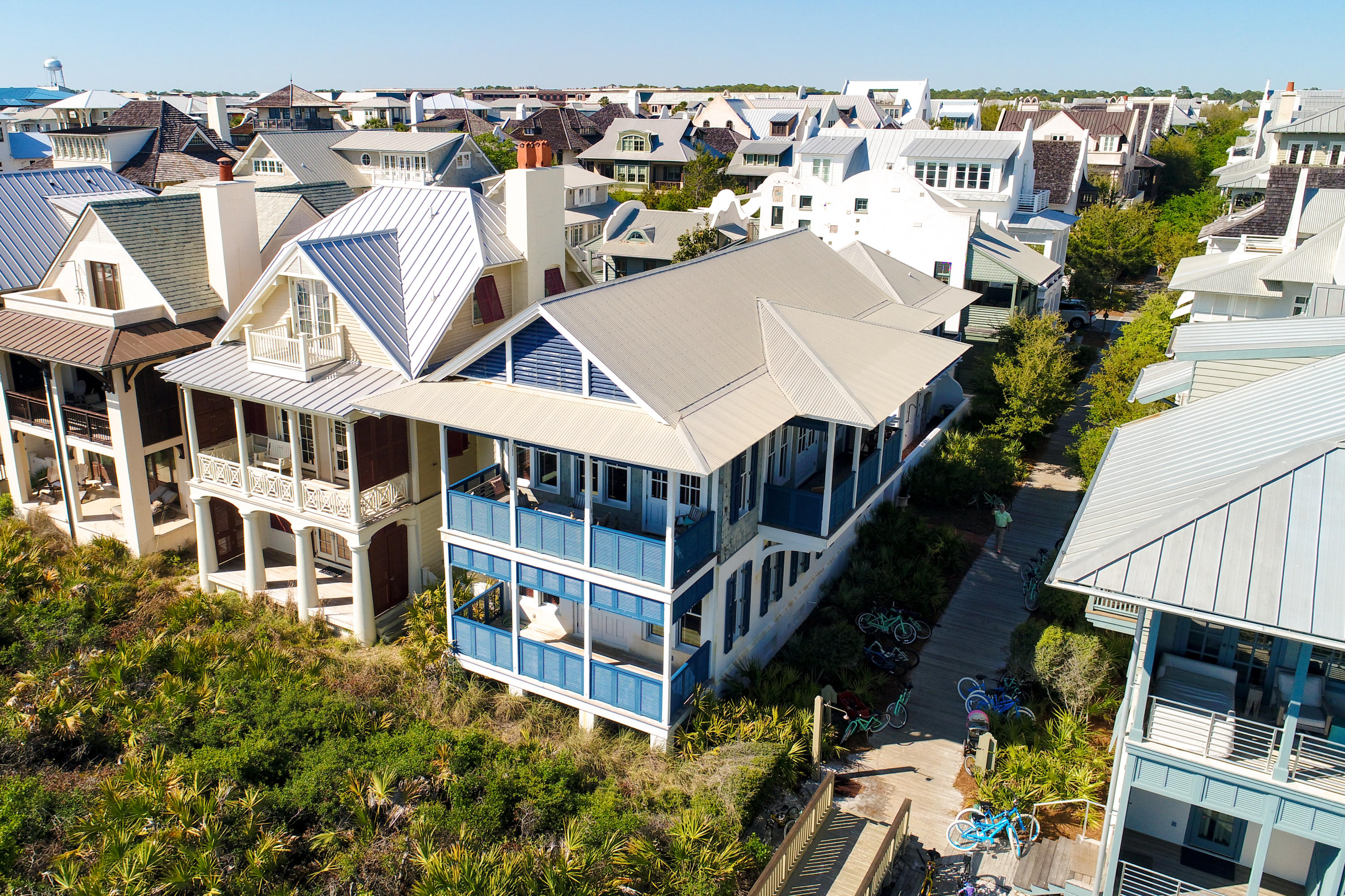 Located in the heart of Rosemary Beach, this Gulf Front sanctuary has everything you need and more. Cathedral ceilings and large windows offer panoramic views of the Gulf. Ideally situated next door to the boardwalk and beach access, steps from the white sand beaches. Privately tucked away, 10 E Spanish Town Court features a full size carriage house with a courtyard. First floor master suite with large guest room and bunk room. Open concept living, dining and kitchen with large doors that open up to an expansive outdoor space overlooking the Gulf is perfect for entertaining. No detail was spared in this exquisite oasis.