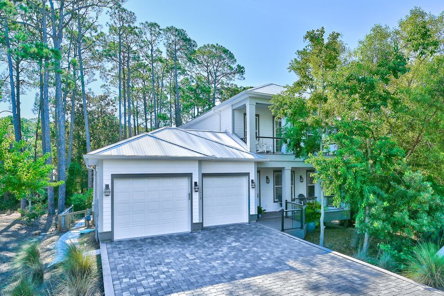 Rare opportunity to own this 4 bedroom, 5 bath,  2 car garage high end home just steps to the Dune Allen Beach access. This home features an open concept living plan with first floor primary bedroom, ensuite bath and large walk-in closet. Kitchen features gourmet stainless appliances and granite countertop. A wet bar has an icemaker. Spacious dining area and the primary bedroom opens to a secluded screened in porch.  The second floor has another primary master ensuite which opens to a covered deck.  There are two other ensuites bedrooms each with walk in closets. This home offers outdoor living at it's best! Enjoy the masonary, wood burning fireplace or settle into the wonderful hot tub while listening to your favorite music.