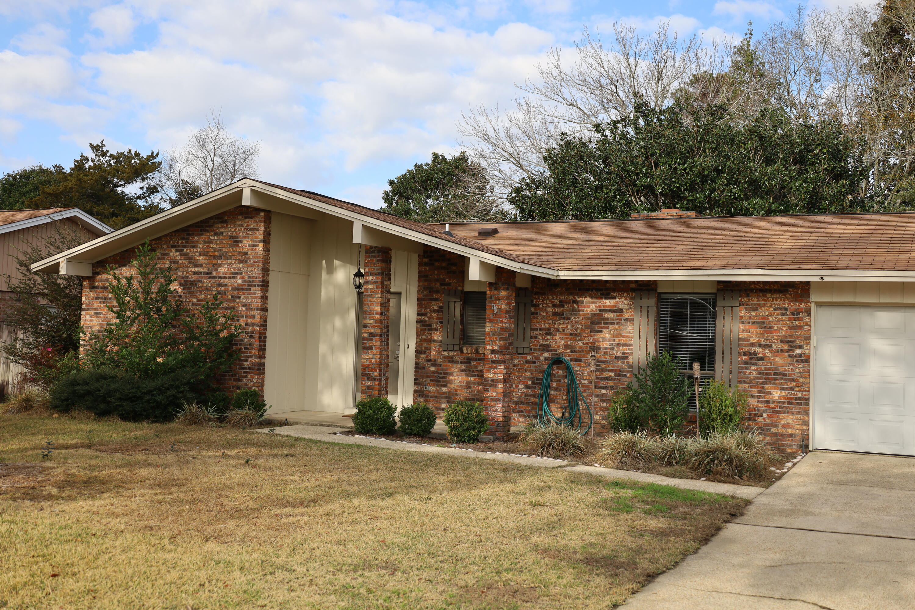 Welcome you to this charming all brick home located in desirable Bluewater Bay Village. This gem hosts upgrades throughout and is a MUST SEE! The spacious kitchen is great for hosting guests and flows directly into the beautiful Florida Room! The Florida Room opens to the back deck where you can host a large BBQ full of family and friends! The sizable backyard is ready for a pool and/or swing set for the kiddos!