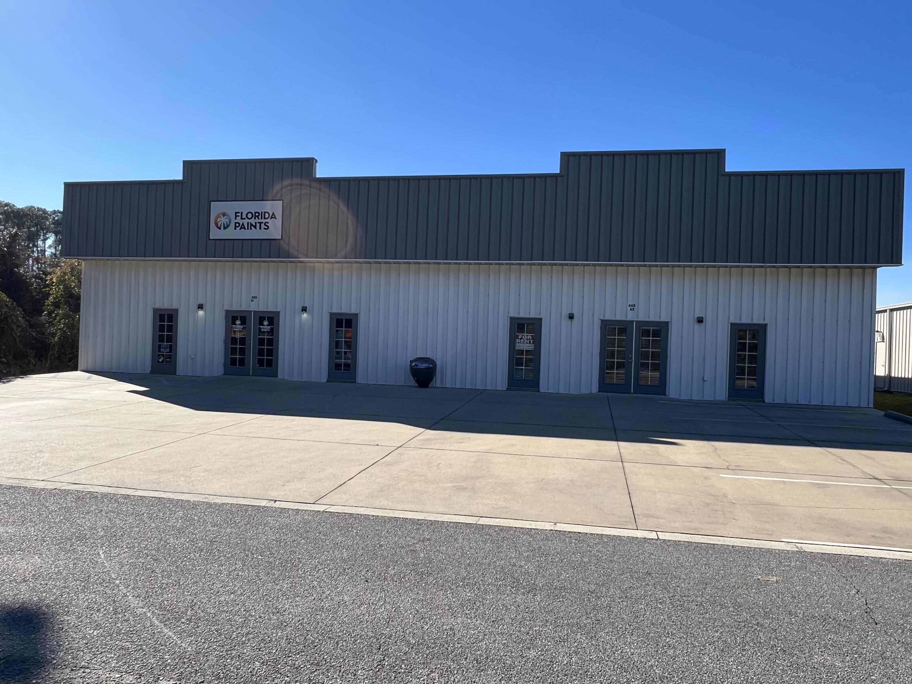 UNIQUE PROPERTY - RETAIL FRONTAGE, FINISHED OFFICE SPACE WITH CLIMATE CONTROLLED WAREHOUSE. Light Industrial/Flex Space with 34' of front footage on Highway 393 in South Walton County providing retail level exposure at a much lower cost. The unit has 3510 sq. ft. of climate controlled warehouse space in addition to 800 sq. ft. of finished office space with kitchenette and private bathroom. Warehouse has 4 skylights (cost reduction benefit) a 14' x 12' roll up door and 1 personnel door. Lease is triple net and tenant pays all utilities and sales tax. Tenant to verify all SF and information for accuracy. One of the lessors is a licensed Florida Realtor. Space is available 2/1/25.
