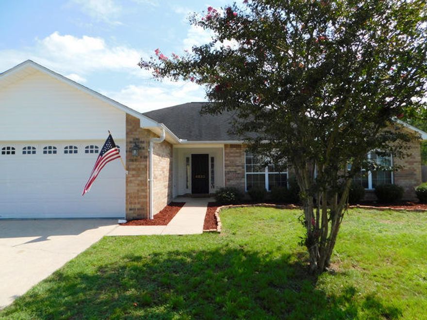 PRICE REDUCED !! South of I-10 with a convenient commute to the bases, beaches and shopping. This all brick, 4 bedroom home is located in a very low traffic area, has an extra large back yard with privacy fencing and a yard building. Inside, there are nice wood laminate floors, an open floor plan, corner, Gas fireplace, vaulted ceilings, newer upgraded fixtures and a large kitchen open to the semi formal dining room. If you are looking for a great home on the south side of Crestview for easy access and want a large lot for room to run, take a closer look at this home before it is SOLD. This home also comes with the extra piece of mind that is being provided by the sellers that are offering a one year home warranty at the time of closing.