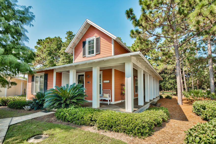 Enter the magnolia lined driveway to the picturesque neighborhood of Laurel Grove and find this charming Florida cottage home! This rare two bedroom floor plan features soaring vaulted ceilings that provide a spacious light filled living and kitchen area with French doors leading to the wrap around porch. This home conveys fully furnished with beautifully refinished real pine wood floors and tile counter tops along with brand new stainless steel refrigerator, microwave, range and dishwasher. Ideally located just across the street from the Laurel Grove clubhouse so you can easily enjoy the fitness room, swimming pool with hot tub, lounge chairs, outdoor BBQ area and a mini kitchen.