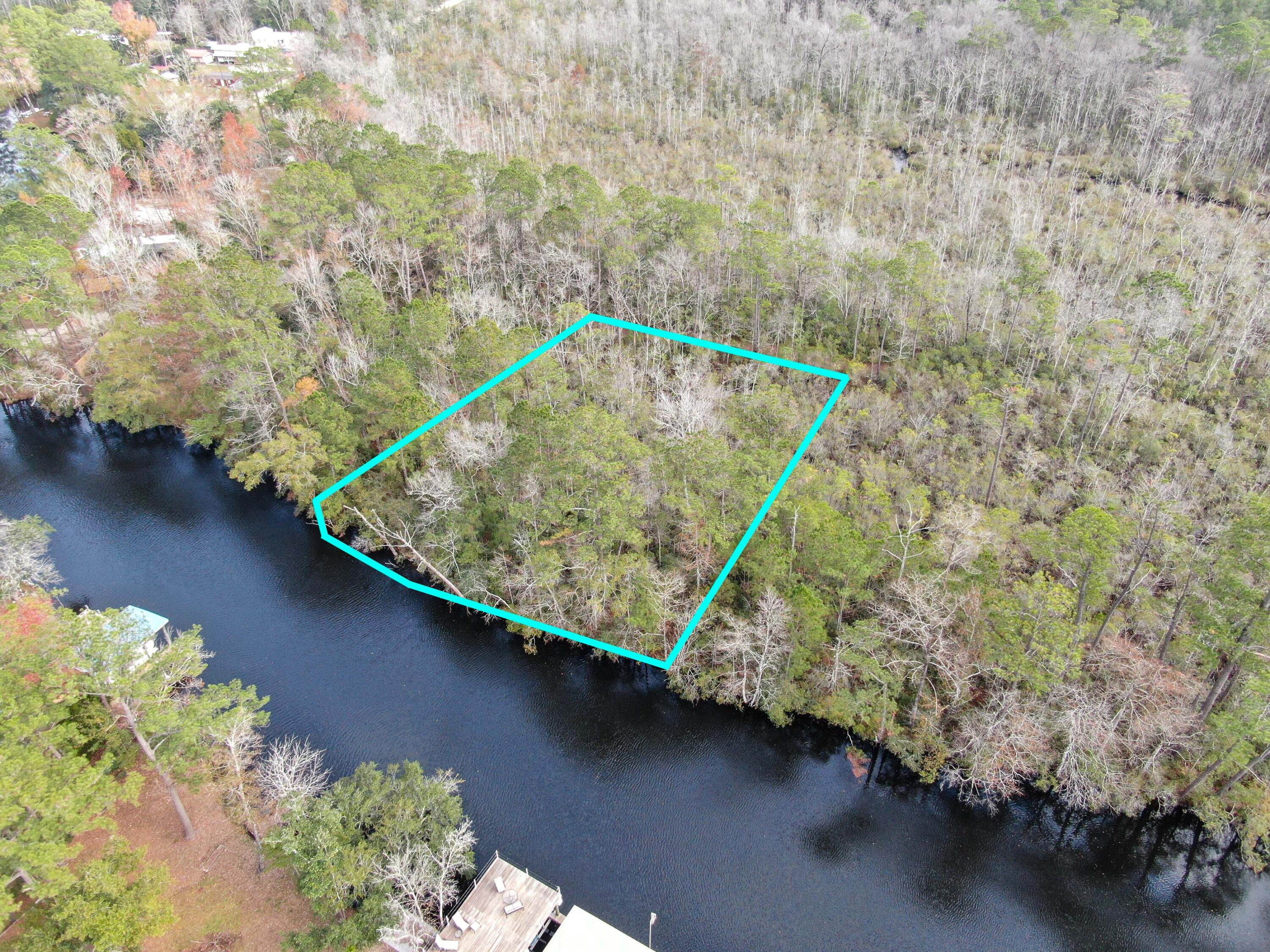Fisherman's Dream. Beautiful 0.44 acre water front directly on deep water lot on Alaqua Creek with access to Choctawhatchee Bay and intercostal waterway to the Golf of Mexico. Build your dream home or a fabulous fish camp in the heart of Freeport.