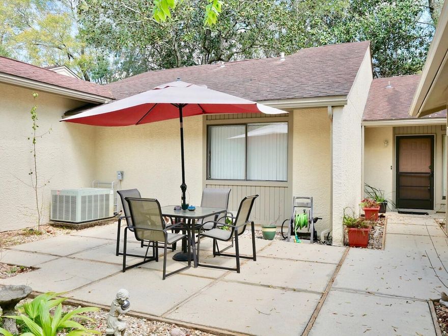Rare Royal Oaks unit with 2 bedrooms, 2 baths and 2 living areas AND a 2 car garage! There are also 2 private patio areas as well as a delightful screened porch. This unit has tile floors throughout and also features a fireplace in the living room.