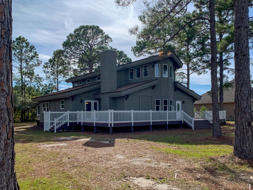 This 3 bed 3 bath home is located in Santa Rosa Ridge subdivision. Located just a few minutes from the beach, Gulf Place, and some of the best restaurants on the Emerald Coast Santa Rosa Ridge is a perfect location for a vacation home. This home has been completely remodeled in 2019. Including new cabinets, flooring, granite countertops, tile showers and free standing tub in master bath. Home sits on 1 and 1/2 lots (0.836 acres) and backs up to a small lake.*Buyer is responsible to verify pertinent details about property. Information contained in this listing is believed to be accurate but is to be verified by buyer.*No HOA fees! A great location to enjoy all that 30A has to offer. Zone ''X''. Buyer to verify all information.