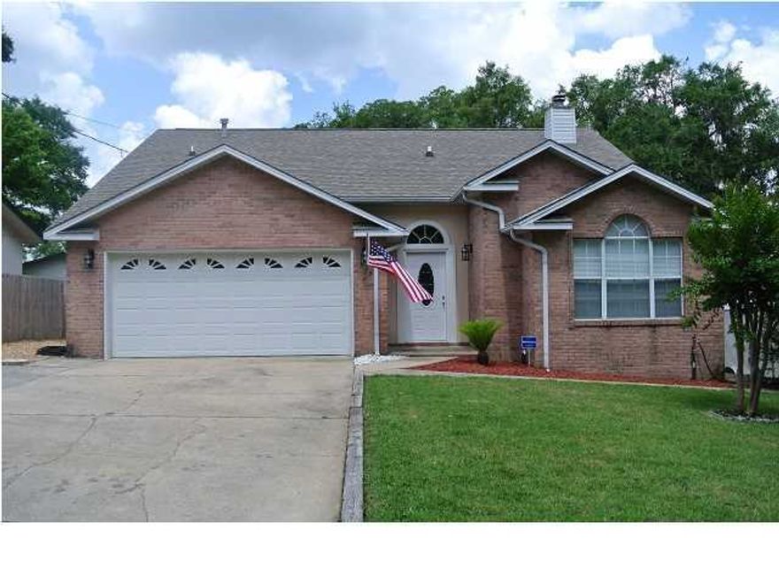 Wow! What a property! Wonderful split floor plan featuring laminate wood flooring, gas fireplace, vaulted ceiling, large kitchen with stainless steel appliances, new A/C and a privacy fenced back yard. The large owners suite offers a double vanity, separate shower and garden tub for soaking, and new laminate floors. The back yard is perfect for entertaining with it's nice deck, heated and cooled out building and large yard. This lovely home is situated on a dead end street and affords privacy. Close to Eglin AFB, Northwest Florida State College, local schools and shopping. This one won't last