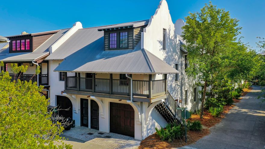 This beautiful courtyard style three-story home with detached carriage house is located on a desirable corner lot overlooking the neighborhood Cabana Pool. Freshly painted and professionally decorated, this inviting residence includes 5 bedrooms and 5.5 baths and totals 4,078 square feet. Enter the home on the first floor and you find a master bedroom suite with a full 2-vanity bathroom, a large laundry/mud room with access to the courtyard, a bunk room that sleeps four, an additional full bathroom, and a second bedroom. The delightful courtyard with private spa has plenty of room for relaxing and entertaining. The second level includes the main living area, with ample dining area and a half bath.