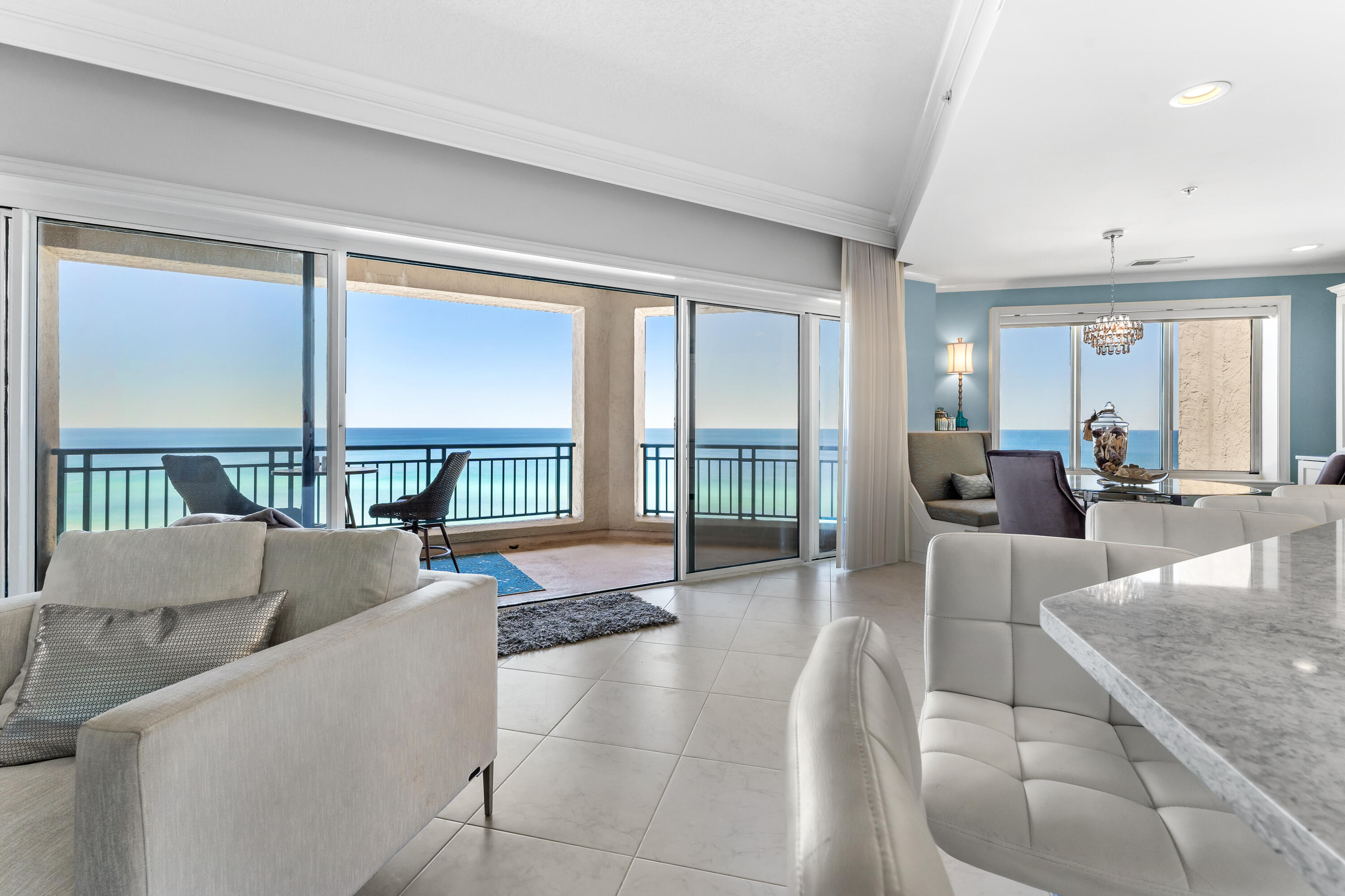Step into this incredible, beachfront 12th floor condo with breathtaking panoramic Gulf views. Located in the highly sought-after Southwinds II, this exquisite home is sure to provide you with an impeccable experience. Southwinds is a rental-restricted community with a private pool and deeded beach access affording its owners exclusivity and privacy. With elegant furnishings throughout, each room is spacious, sliding glass doors that open to a wraparound balcony overlooking the Gulf. Gorgeous resort and bay views can be seen from the additional, smaller balcony off the second bedroom. You will find ample storage in this condominium with both large closets and a storage cage on the ground level. Two covered parking spaces. HVAC & water heater 4 years old. Sub Zero refrigerator, Bosch oven, Bosch dishwasher., Ice maker and two undercounter refrigerator drawers. This condo is a great place to entertain your friends and family. Located within the gated community of Sandestin, owners and their guests also enjoy a private swimming pool, tennis, pickleball, fitness room, outdoor kitchen area with BBQ Pit/Grill, world-class golf courses which are frequented by the PGA Tour, fishing, private marina access, and a gated dog park. Sandestin is a master planned community located in close proximity to world class shopping, dining, and entertainment options including the on-site Baytowne Wharf commercial center, Grande Boulevard, the Sandestin Outlets, and all the offerings along the iconic Scenic Highway 30A.