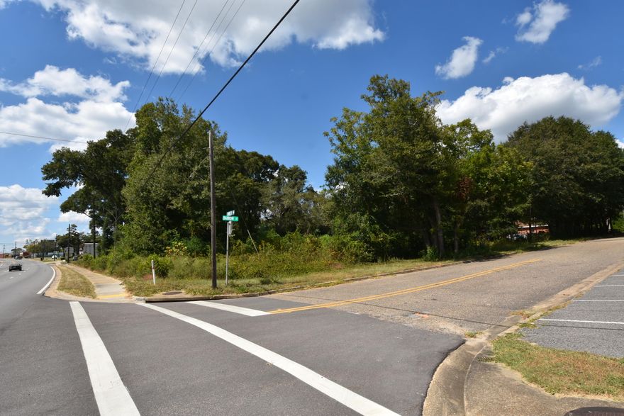 Corner lot at the corner of the north side of Hwy 90 East & Barrow Street. Located across from Twin Hills Park just over 1/4 mile east of the intersection of Hwy 90 & Hwy 85. Formerly there was a house on the property so some utilities may be existing on the property. The road frontage is: 150 feet on Hwy 90 and 140 feet on Barrow Street. Both the Zoning and Future Land Use are commercial.