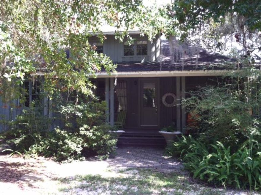 Architecturally designed Florida cottage set in the Historic District of Point Washington surrounded by majestic oaks, magnolias, antique azaleas, & wisteria on over a 1/2 acre with room for a pool and carriage house. Designed in 1995 by Richard Gibbs (Town Architect for Seaside & Rosemary Beach), w/ a deep wrap around porch, spacious first floor master, 2'' antique pine floors, T & G ceilings, 8ft cypress doors, antique interior doors, 4 bedrooms, 2 1/2 baths + an outdoor shower under the oaks off the master bath. Designer updates include custom luxury bathrooms and upgraded details throughout. Featured in Coastal Homes & Lifestyle in 2008. Enjoy the beach, bay, 395 boat ramp & 30A within minutes while living among the peace and tranquility of Eden Gardens. Walk your children to school!