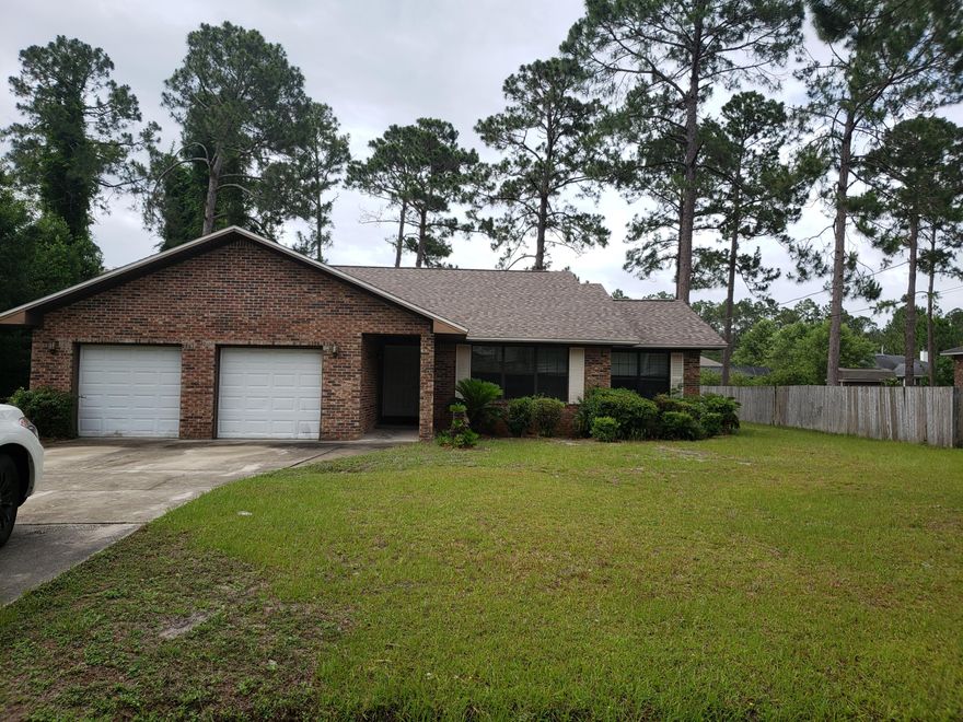 Great brick sided three bedroom two bath home in holley by the sea.  Includes all ammenities