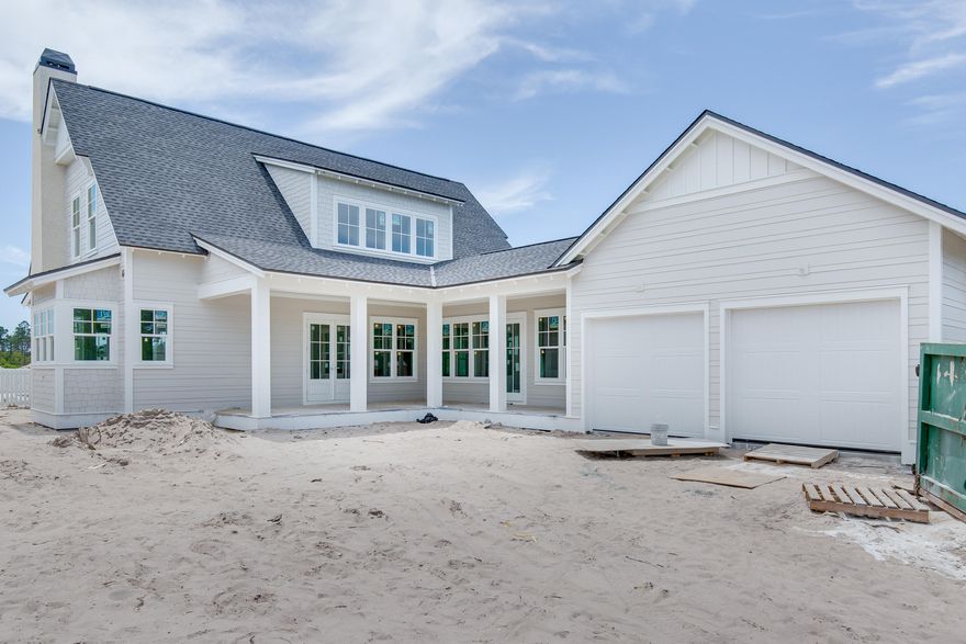 The Weatherly, a Cape Cod style floor plan, boasts an abundance of outdoor living space, with 2 covered porches, summer kitchen, cabana with outdoor fireplace, and a private pool! This plan offers 4 bedrooms, 4.5 baths and a 2-car attached garage.The kitchen, with a pantry and center island, opens into the large great room and is adjacent to a breakfast nook. Featuring a first floor Master Suite with 3 bedrooms upstairs and a bunk room, this thoughtfully designed floor plan offers plenty of space for family and guests. Interior features include quartz countertops in kitchen, Carrera marble counters in baths and utility, a designer lighting package, solid core doors, engineered wire-brush hardwood flooring in living areas, porcelain tile in baths, and premium carpet in bedrooms.