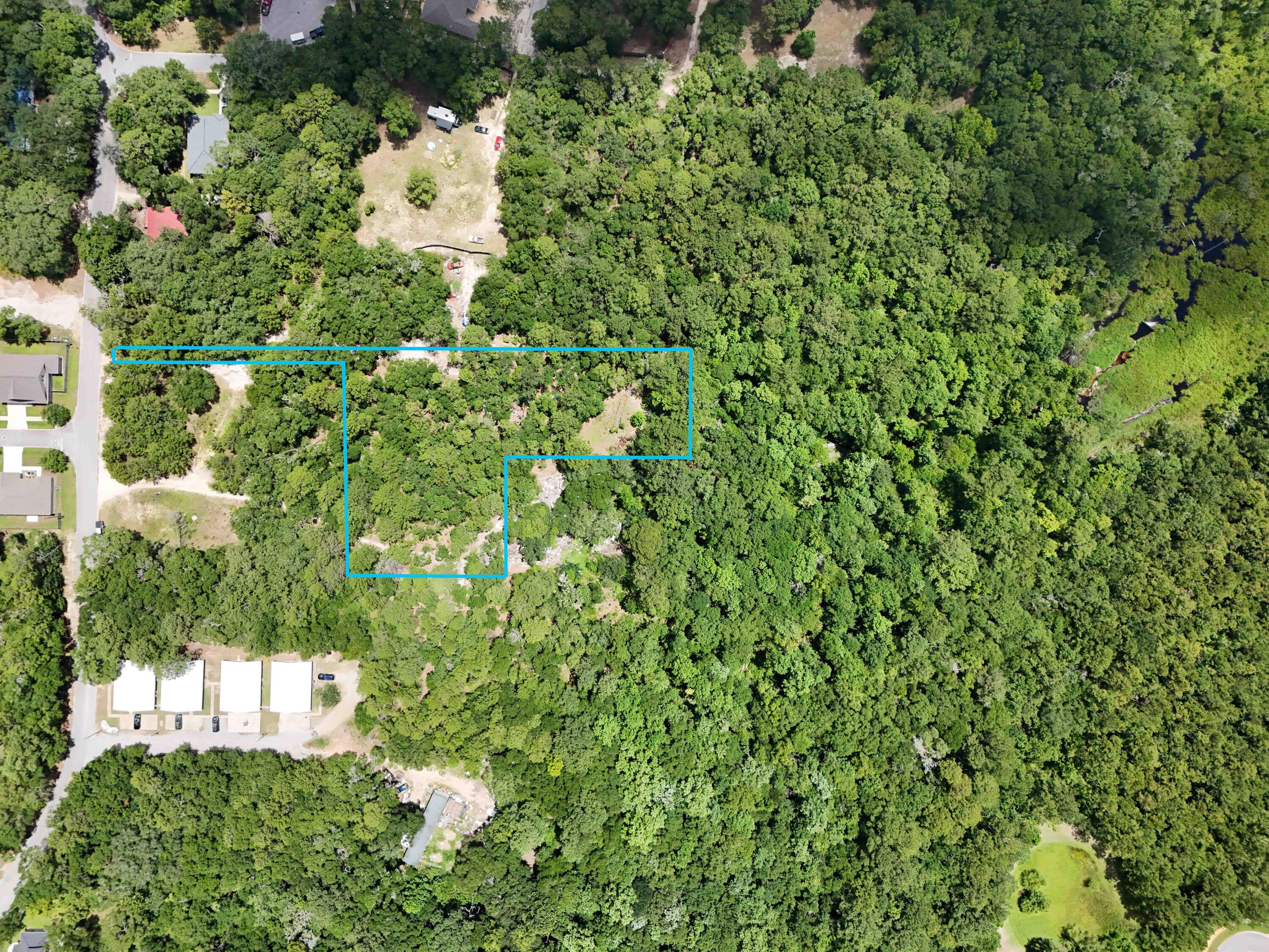 Come check out this 1.5 secluded acres that contain 2 individual parcels zoned R-3 within the City of Freeport. Build a home or multiple homes with this zoning. Be close to public boat launches, city parks, A rated schools, city pool, and be close to all the action that Freeport and South Walton has to offer from shopping, dining, and entertainment. You also never have to miss a sunset on the water because you are only 30 mins from some of the world's most beautiful beaches. Make these 2 parcels yours.