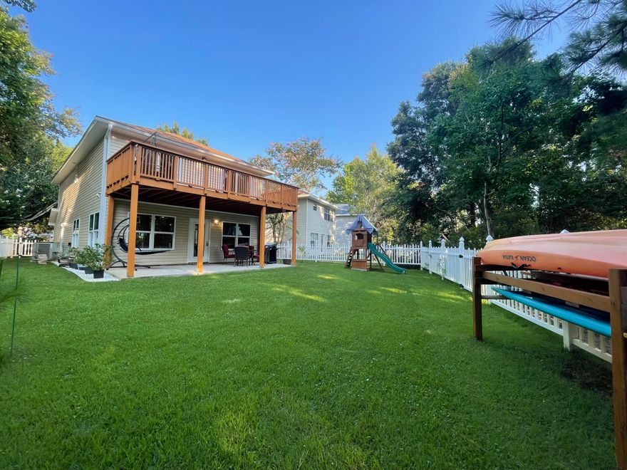 This 2018 home is like no other in Twin Lakes! You'll absolutely love the privacy of a lush green backyard overlooking a wooded nature preserve with partial views of the lake. The large covered patio and deck are ideal for entertaining. Inside you'll find an open floorpan with lots of living space and plenty of natural light thanks to the large hurricane windows and doors throughout. The kitchen is outfitted with stainless appliances, granite, touchless faucet, smart switches, and more. Custom upgraded wood cabinets have 2 tier silverware drawer and soft close hinges. Upstairs the master bedroom has his and her closets and a master bath with plank tile and granite counters. There are 2 additional bedrooms upstairs with direct access to the large deck overlooking the nature preserve.