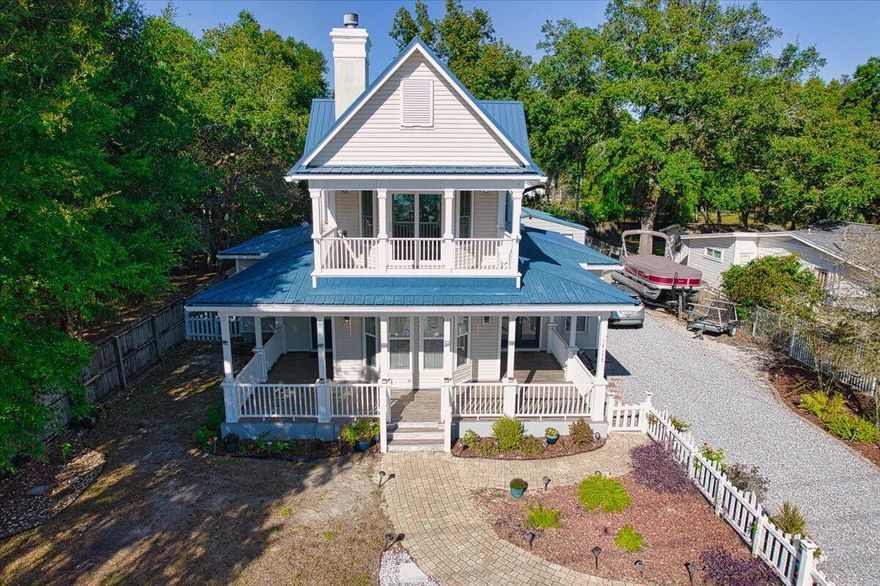 Beautifully renovated 4BR/3BA Victorian with panoramic views of Choctawhatchee Bay. Over $250,000 in updates completed in 2020. This home offers high ceilings, triple crown molding, custom wood trim, hardwood floors, and a cozy fireplace. The kitchen features quartz countertops, soft-close cabinets, custom tile, and upgraded lighting. All bathrooms are fully updated with high-end finishes.Natural light fills the home, and nearly every room offers a bay view. Multiple outdoor living spaces provide the perfect setting to enjoy the scenery. Located approx. 3 miles from the Mid-Bay Bridge, shopping, dining, and both military bases. Meticulously maintained--move-in ready with true attention to detail throughout. This home also has Hurricane shutters, 2020 Roof, 2020 HVAC (2 Units) Controlled access gate to enter the property. A beautiful gated entryway with pavers lead you to the wrap-around front porch that welcomes you to relax and enjoy outside living. Septic was pumped in 2020. The detached 2 car garage has lots of storage and space. There is also a separate smaller metal shed on the back of the lot.  