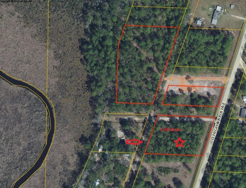 1.5 acres as two lots on Bay Loop Road, full of oaks and pines. Great location, peaceful and no HOAs. Would be great investment for homesite, barn, pole barn, family compound. X flood zone.